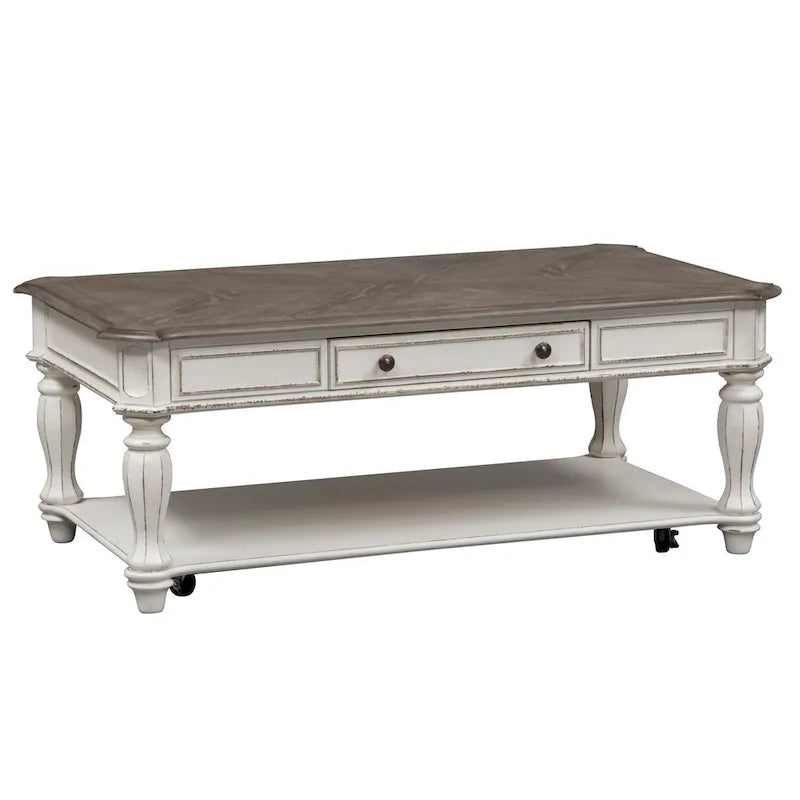 Rectangular Cocktail Table in Antique White with Weathered Top Turned Legs Casters and Bottom Shelf