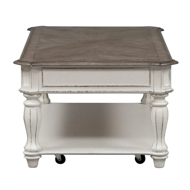 Rectangular Cocktail Table in Antique White with Weathered Top Turned Legs Casters and Bottom Shelf