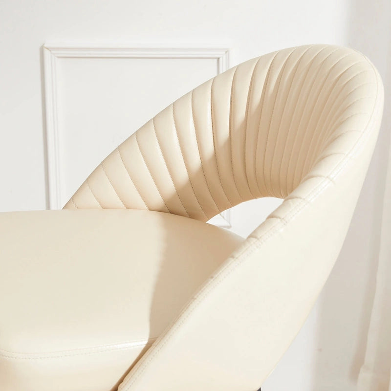 Modern Quilted Faux Leather Bar Stool with Tapered Steel Legs and Footrest